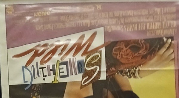 Actual Something Wild — home-video promotional poster detail image 2