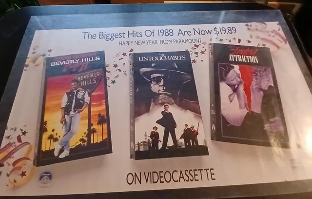 Actual Biggest Hits of 1988 — multi-title video-store promotional sheet front photograph