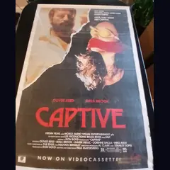 Actual Captive — home-video promotional poster detail image 1