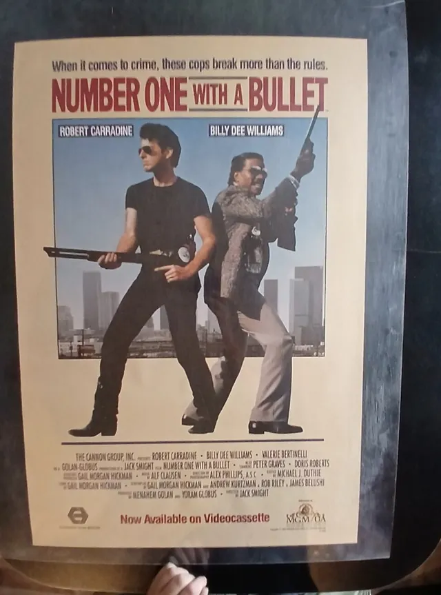Actual Number One with a Bullet — home-video promotional poster front photograph
